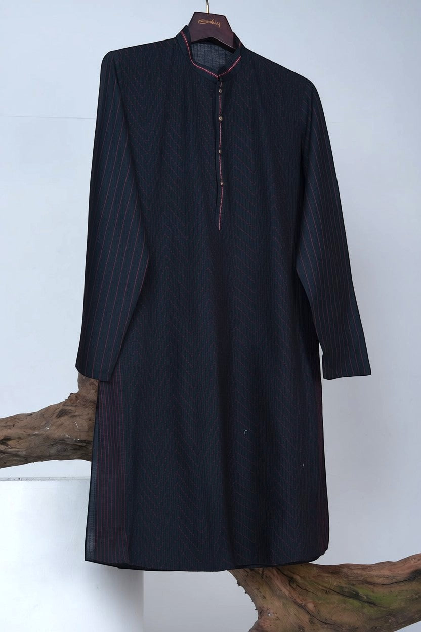 Orly black cotton blend kurta with subtle pintex texture and red pinstripe detail. Mandarin collar, button placket. Evening wear.