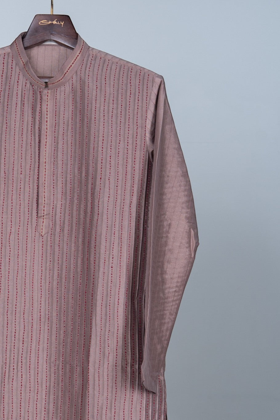 Orly brown cotton blend kurta with vertical Kantha stitch detail and red stripes. Ideal for festive occasions.