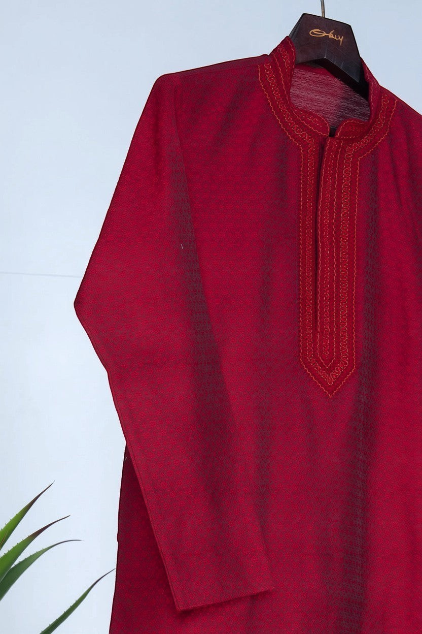 Orly deep red cotton silk jacquard kurta with tonal hand embroidery on neckline and placket. Festive wear.