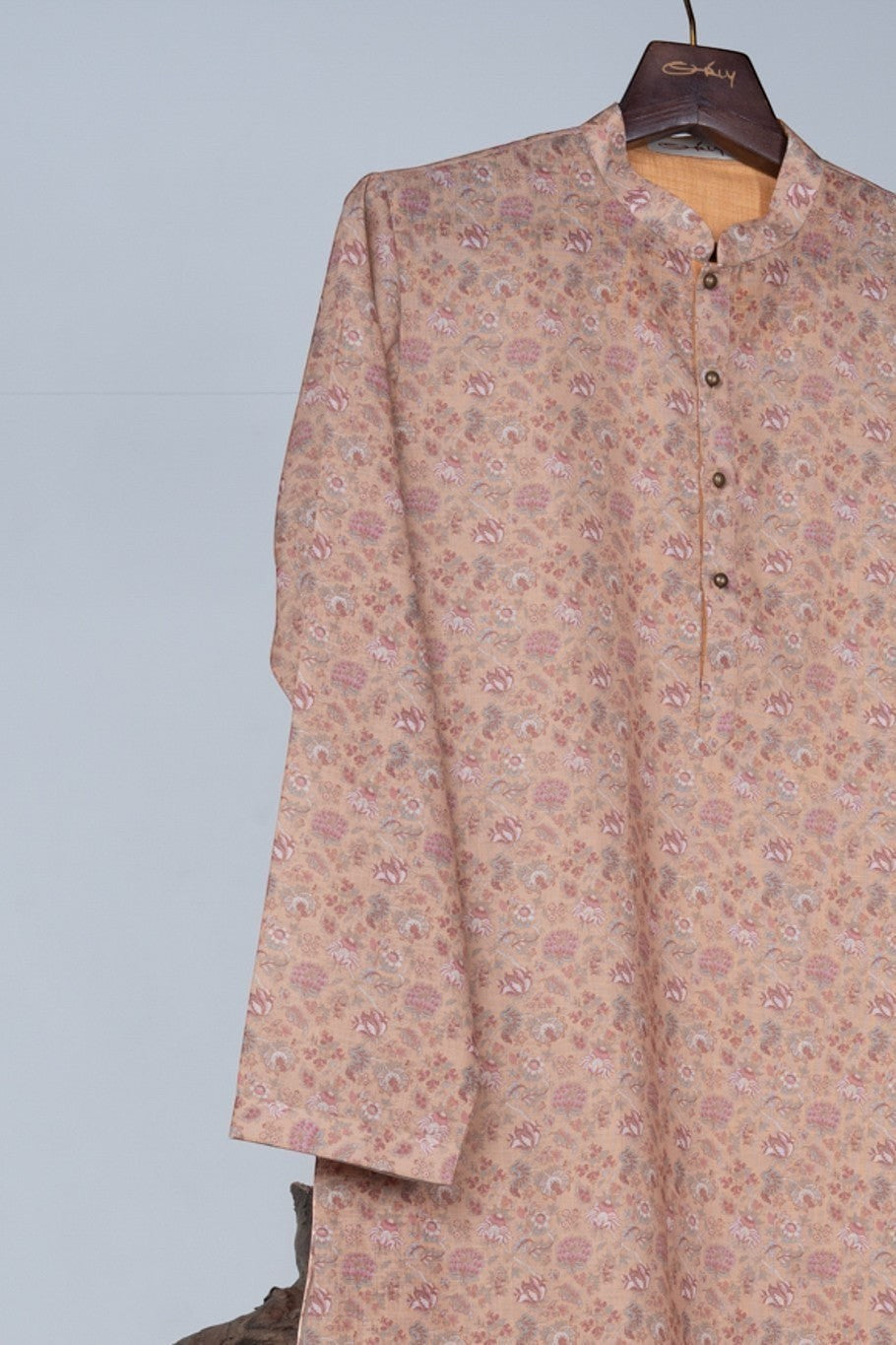 Orly beige kurta with all-over rose floral print in blush and grey, cotton blend, band collar, button placket.