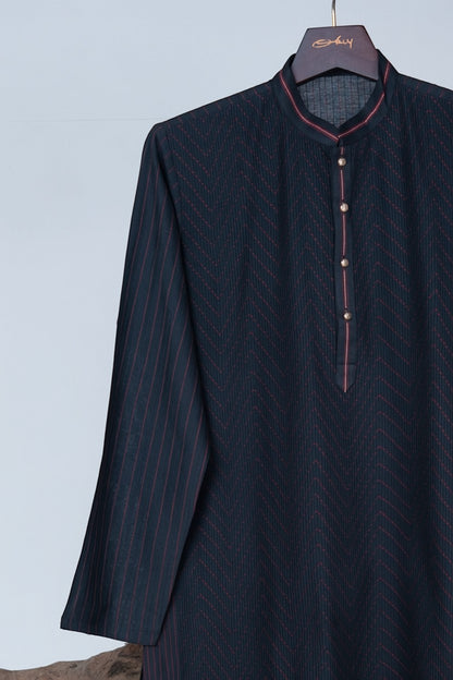 Orly black cotton blend kurta with subtle pintex texture and red stitching detail. Designed for evening wear.