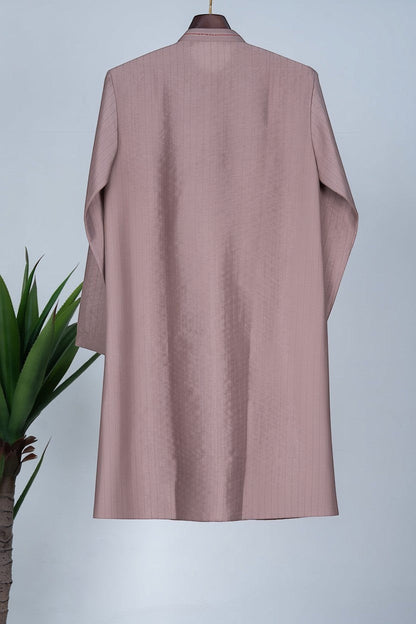 Orly brown cotton blend kurta with Kantha-style stitch work and a soft matte finish, ideal for festive occasions.