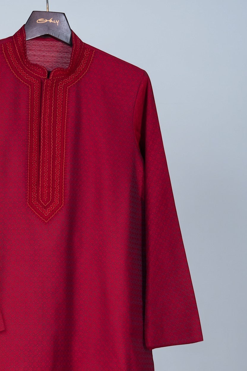 Orly deep red cotton silk jacquard kurta set with woven motifs and hand-embroidered neckline, perfect for festivities.
