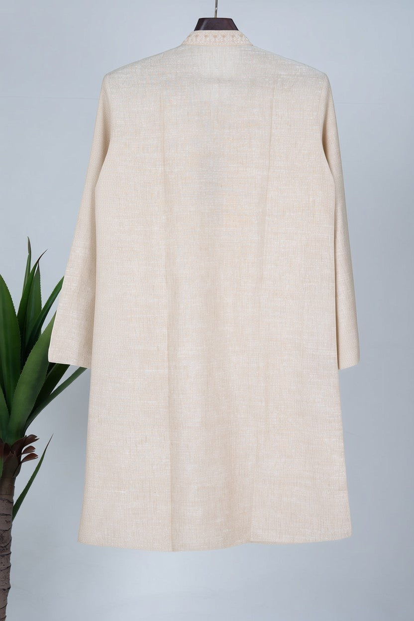 Orly ivory linen blend kurta with intricate hand embroidery on neckline and placket, paired with off-white pyjama.