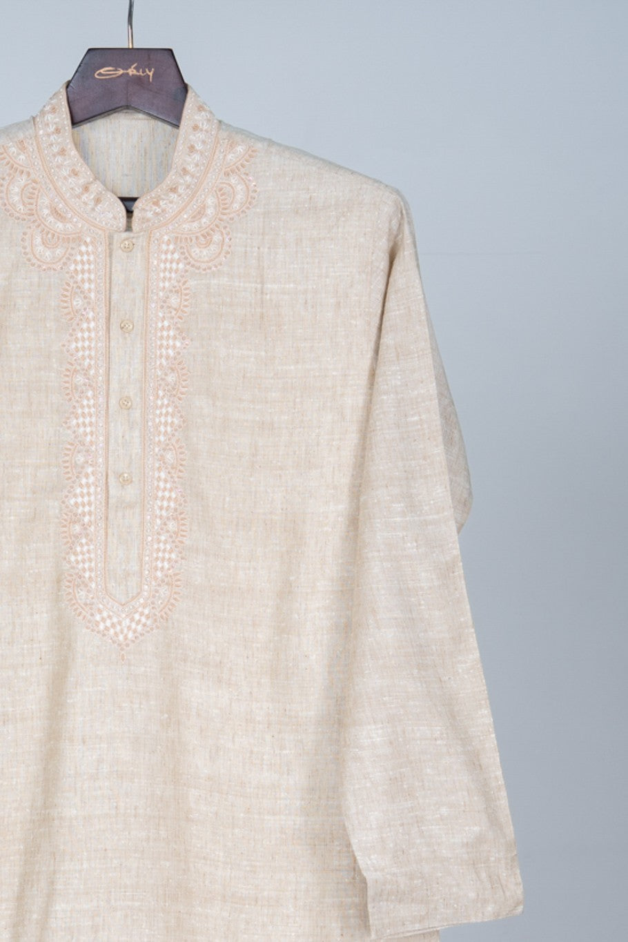 Orly ivory linen blend kurta with intricate hand embroidery on neckline and placket, paired with off-white pyjama.