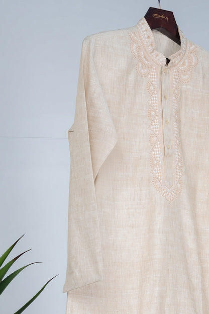 Orly ivory linen blend kurta with intricate hand embroidery on neckline and placket, paired with off-white pyjama.
