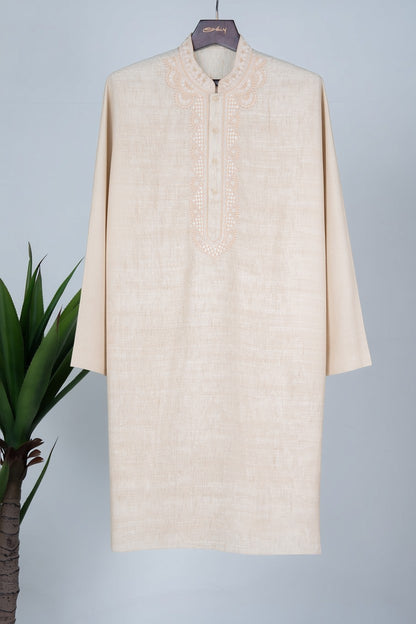 Orly ivory linen blend kurta with intricate hand embroidery on neckline and placket. Includes off-white pyjama.
