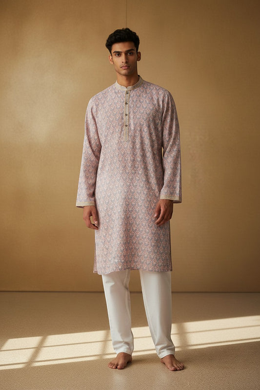 Orly mist pink kurta with all-over floral print and sequin highlights. Features contrast detailing on collar and placket.
