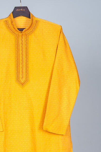 Orly mustard yellow cotton silk jacquard kurta with hand embroidery on neckline and placket. Festive wear.