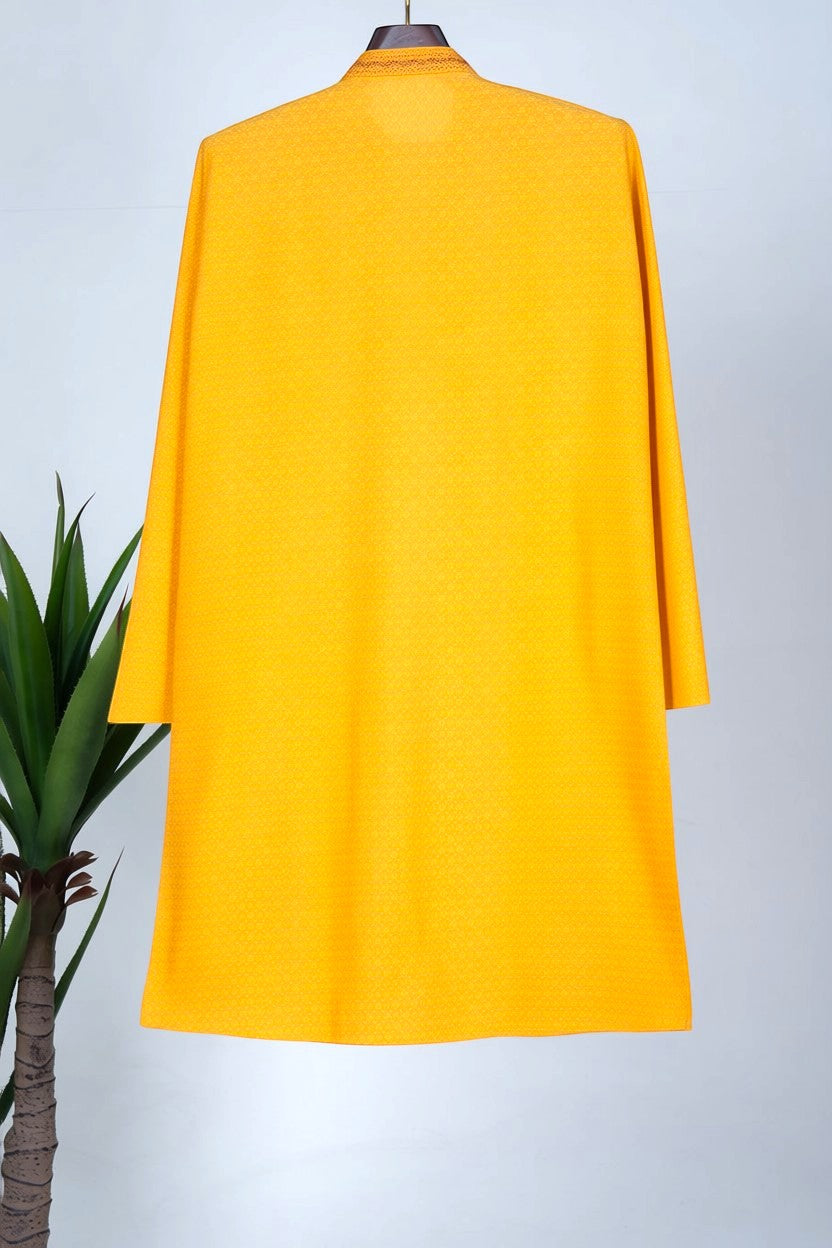 Orly mustard yellow cotton silk jacquard kurta with woven motifs and hand-embroidered neckline, suitable for festive wear.