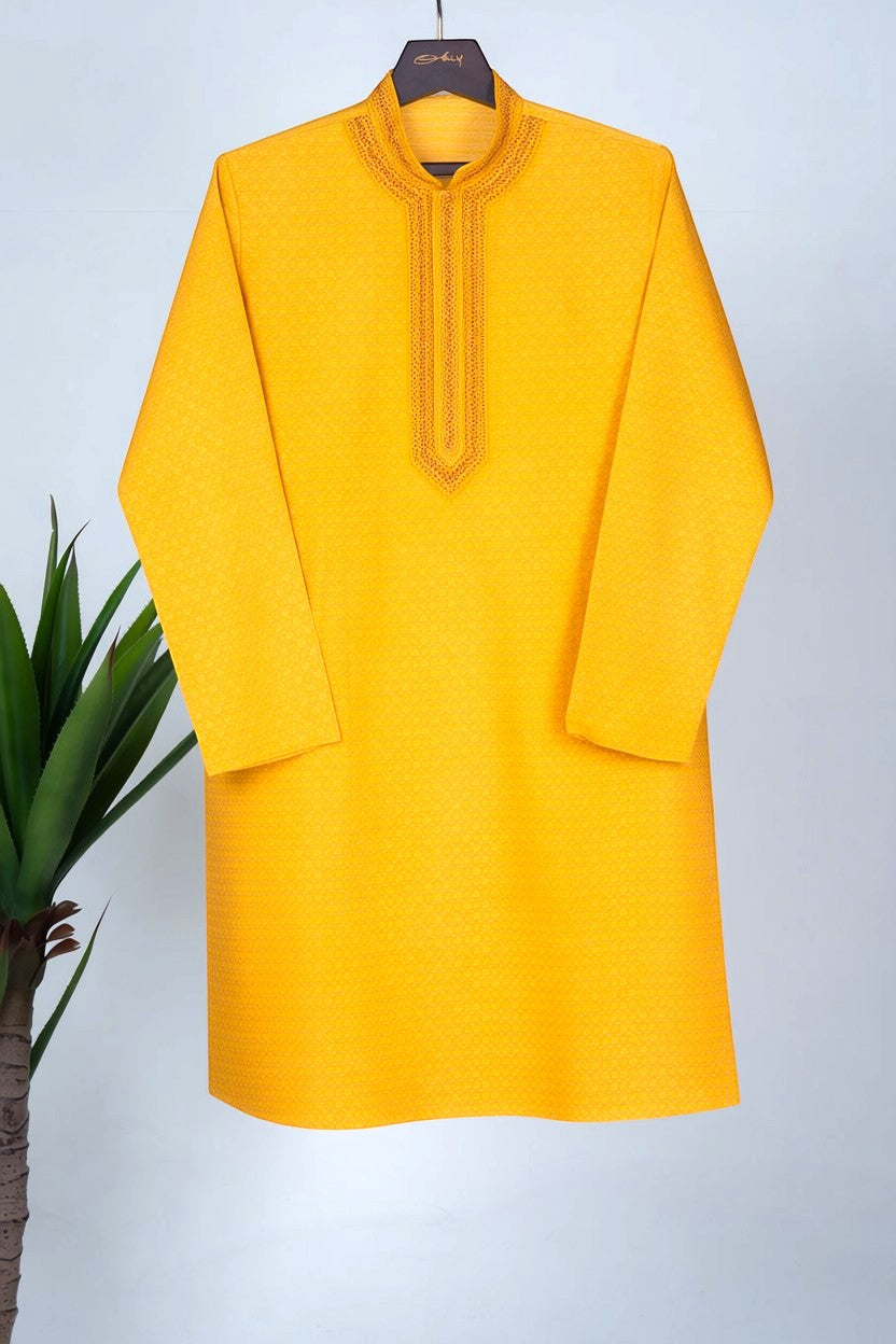 Orly mustard yellow cotton silk jacquard kurta with woven motifs and hand-embroidered neckline and placket.