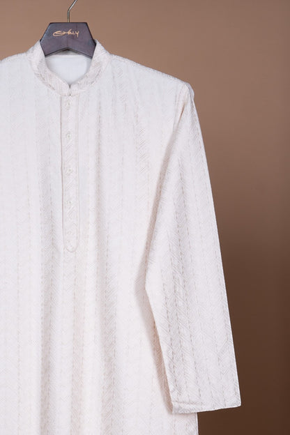 Orly off-white cotton blend kurta with embroidered stitch work and mandarin collar. Ideal for festive occasions.