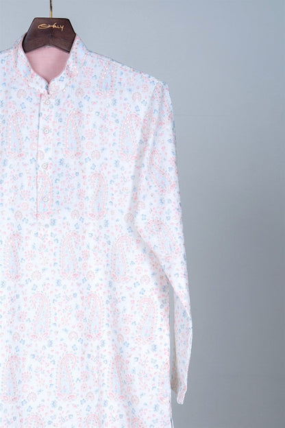 Orly powder blue kurta with pink paisley and floral print, sequin accents, and pink collar. Cotton blend.