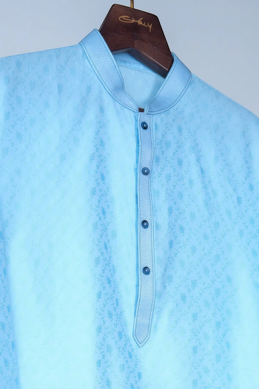 Orly sky blue jacquard kurta with subtle vine motifs, band collar, and contrast placket detailing.